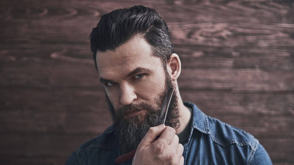 Bearded Man with straight razor